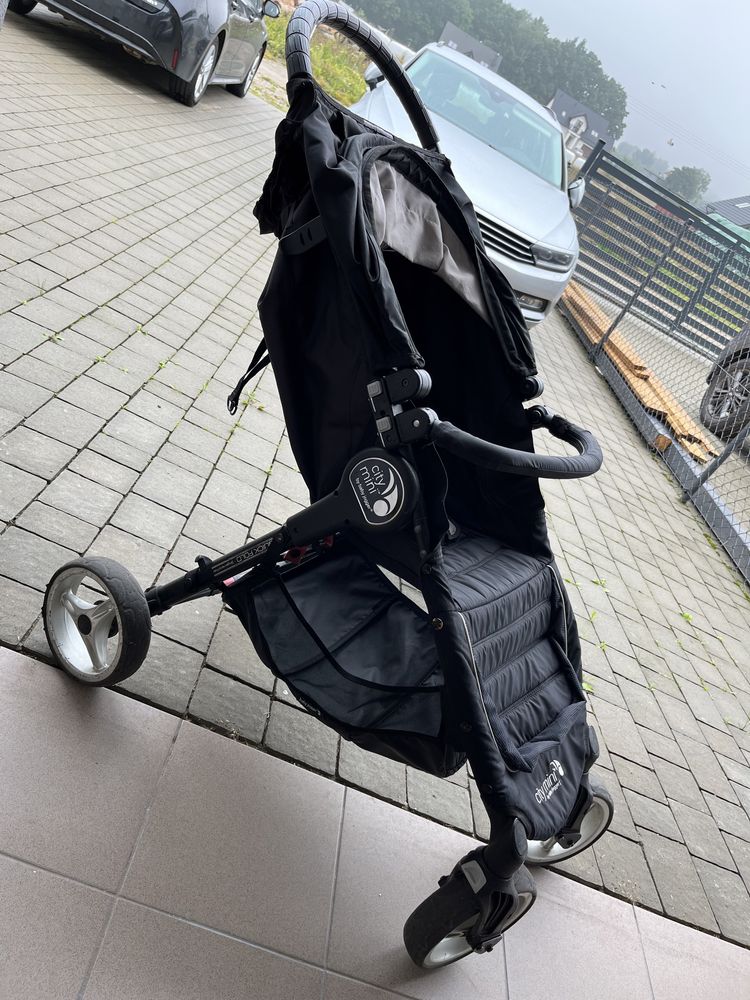 Wózek dziecięcy Baby Jogger City Mini 4W z gondolą i śpiworkiem