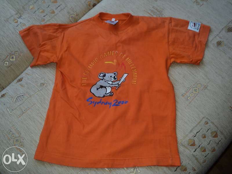 bluzka pomarańczowa/ T-shirt roz. 140