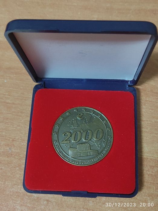 Medalha e moedas de colecção