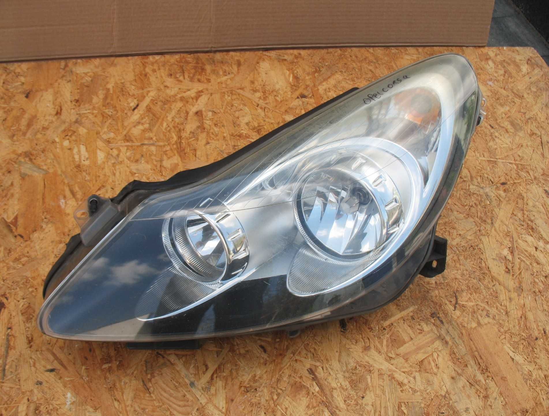 Opel Corsa D lampa Lewa przód Oryginał EU