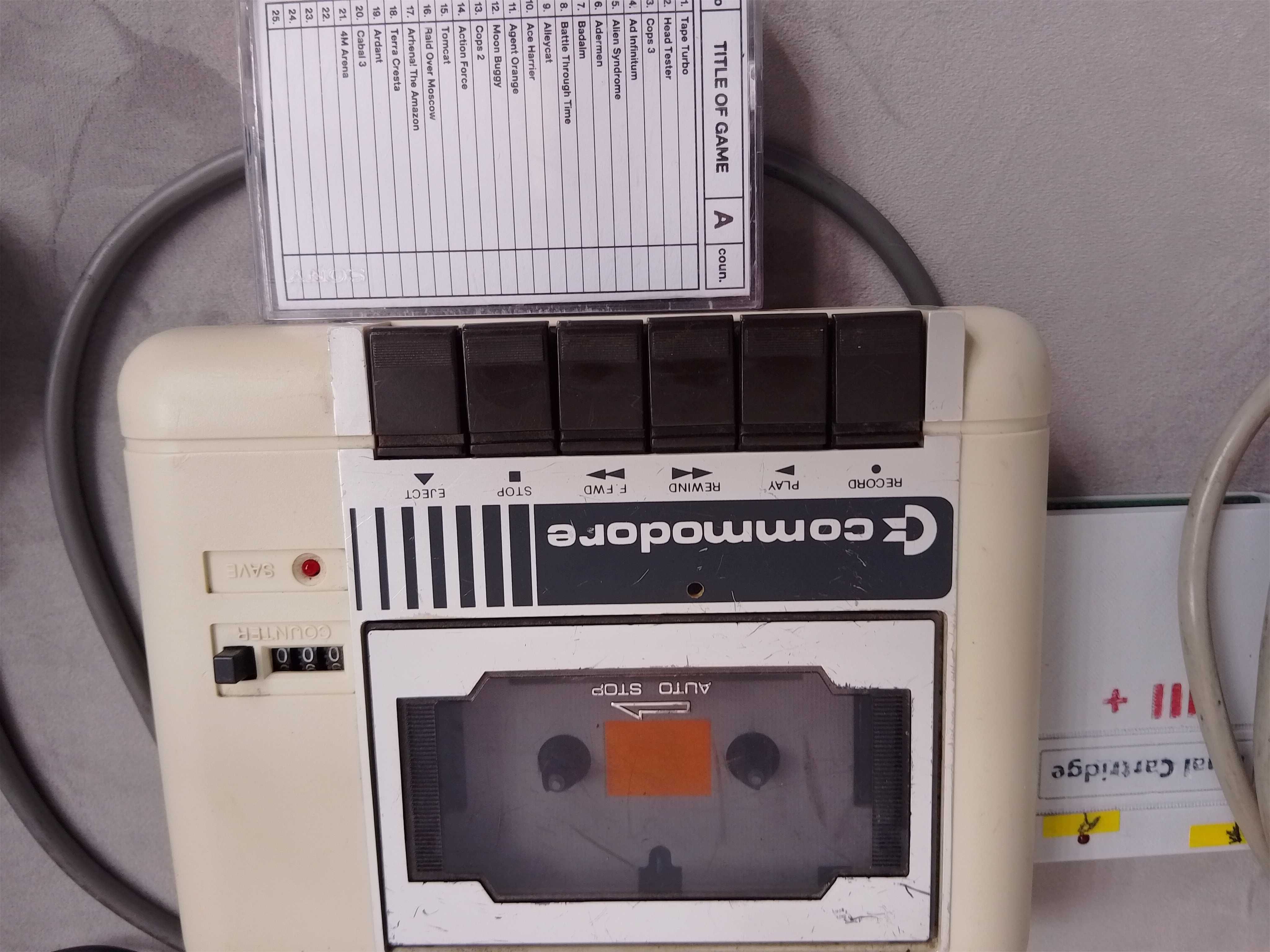 Commodore C64G / zestaw, kasety , joystick , cartridge