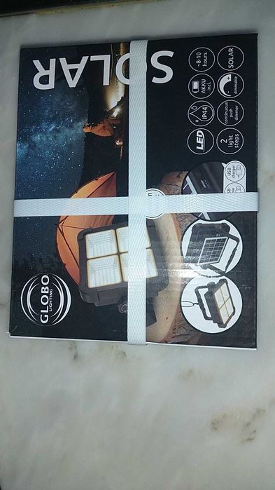 Holofote para campismo com painel solar