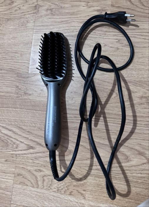 Escova de alisar o cabelo