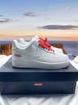 Nike Air Force 1 Low Supreme White.	43