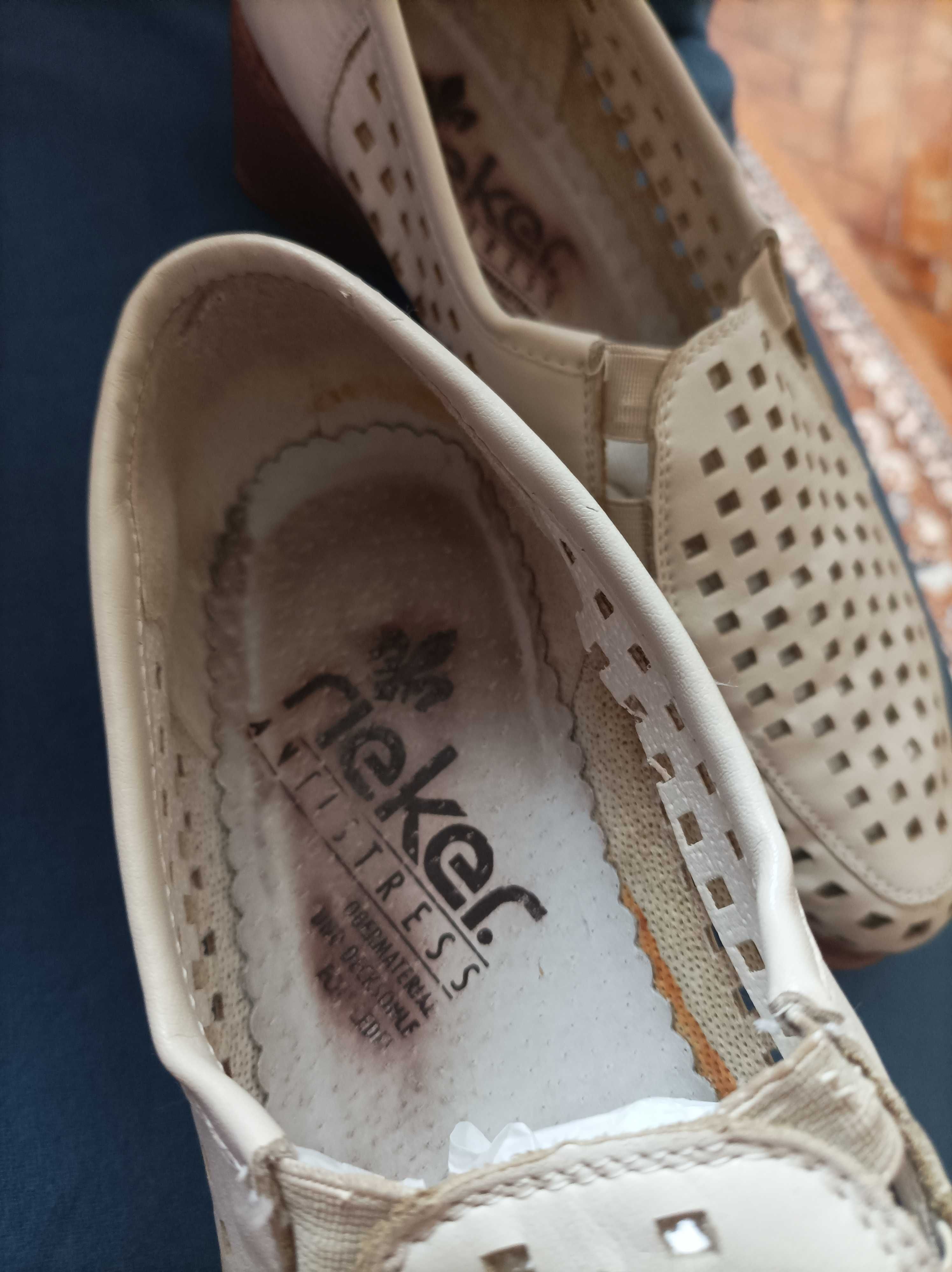 Продам женские кожаные летние туфли известной фирмы Rieker,и мужские
