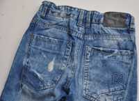 35 RESERVED Spodnie jeans z przecierkami r 146
