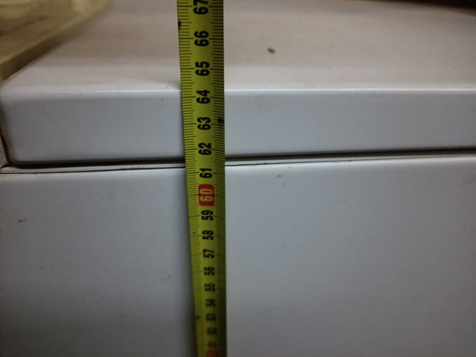 Пральна машинка вертикального завантаження