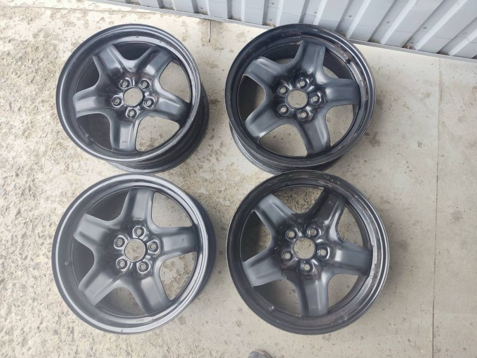 Диски з колпаками на Opel Astra, Zafira