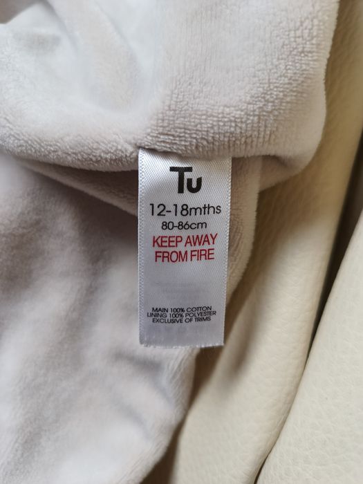 Dziecięcy niemowlęcy uroczy beżowy ciepły sweterek na guziki unisex