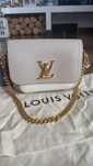 Louis Vuitton Lockme tender z dokumentami