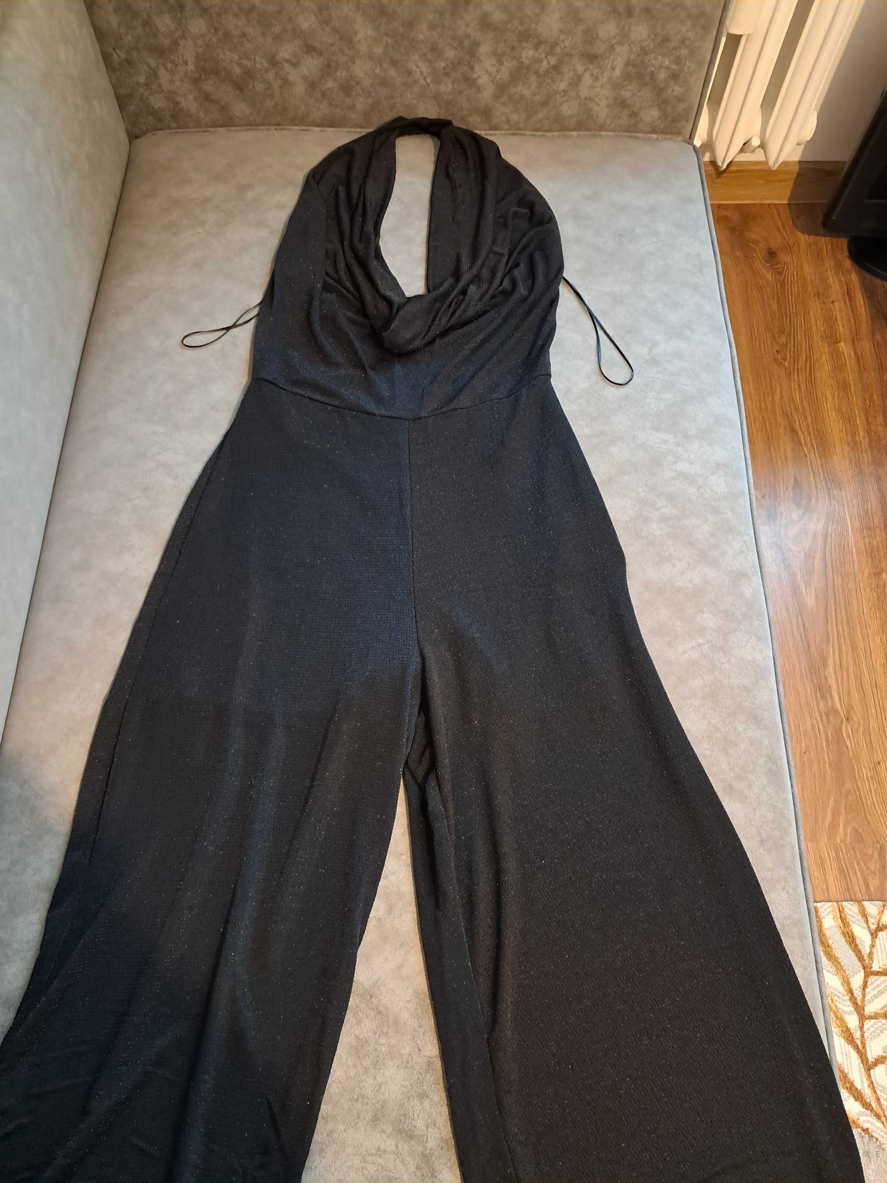 Kombinezon damski czarny z błyszczącą nitką Gina Tricot rozm. M/L