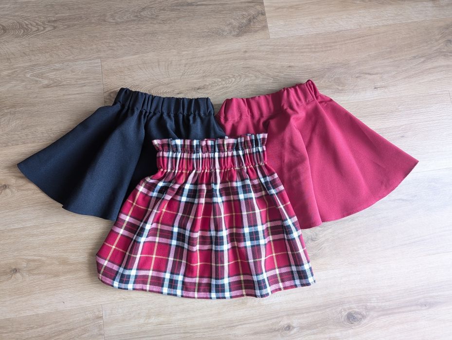 Spódniczki 3pak dla dziewczynki czarna czerwona i kratka 104/110