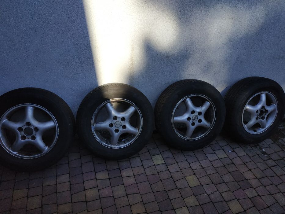 Koła letnie na aluminiowych felgach Opel