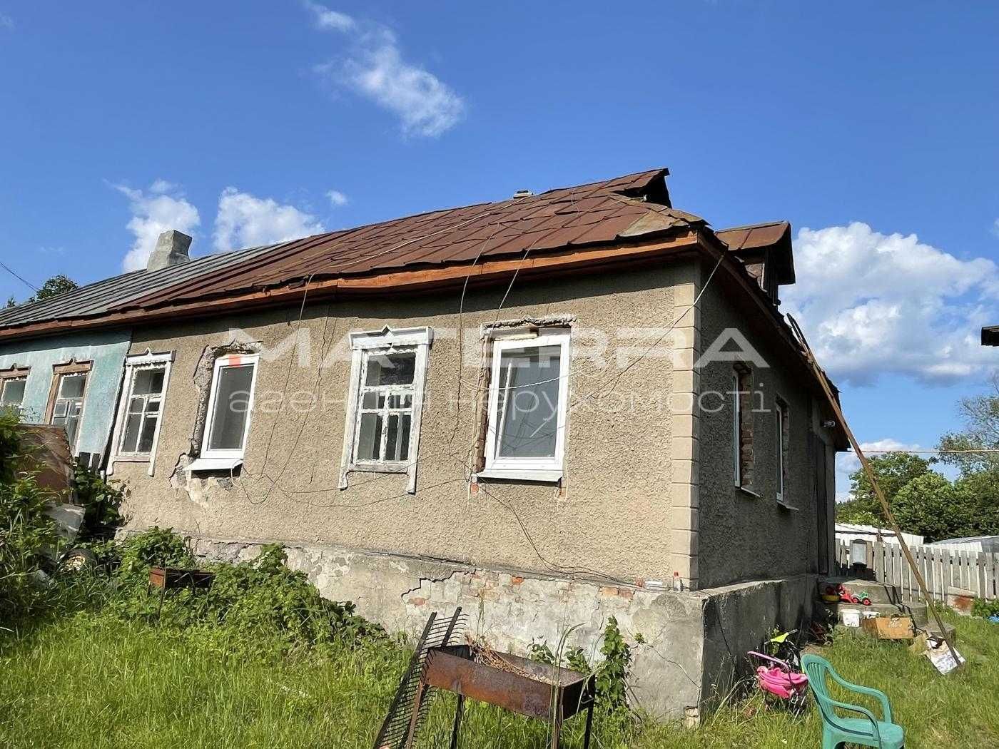 Малютянка продам пів будинку 57 м2 з виходом у ліс та своїм озером