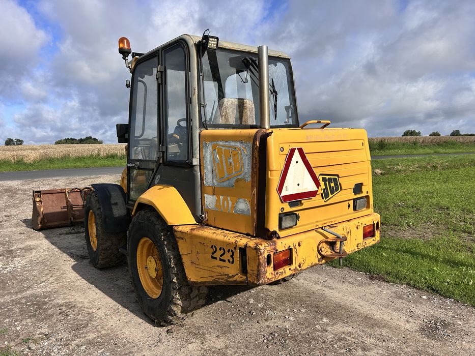Ładowarka miniładowarka przegubowa JCB 406