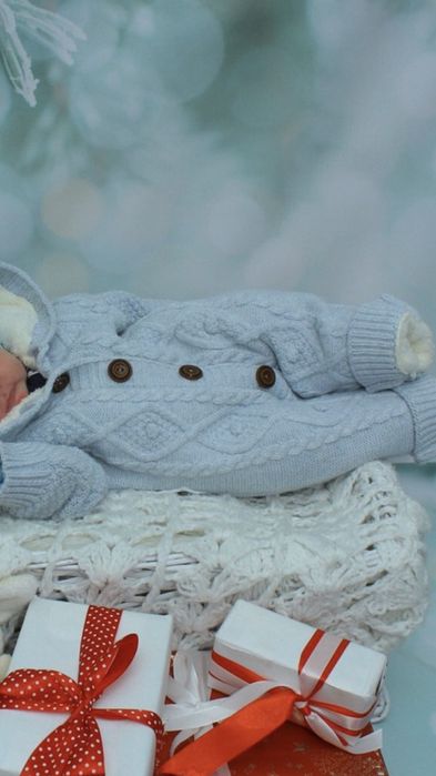 Вязаный теплый  комбинезон человечек