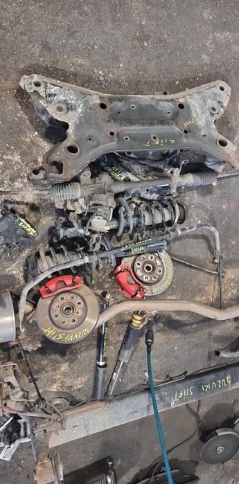 amortyzator sprężyna wahacz zacisk piasta belka Suzuki Swift III