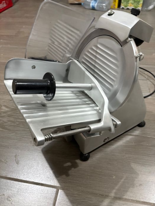 Máquina de cortar carnes