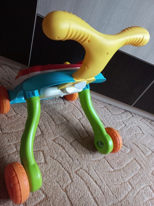 Дитячі ходунки-каталка, ігровий центр-столик Перші кроки 2в1