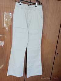 світлі брюки широкі штани кльош розмір  42- 44 наш