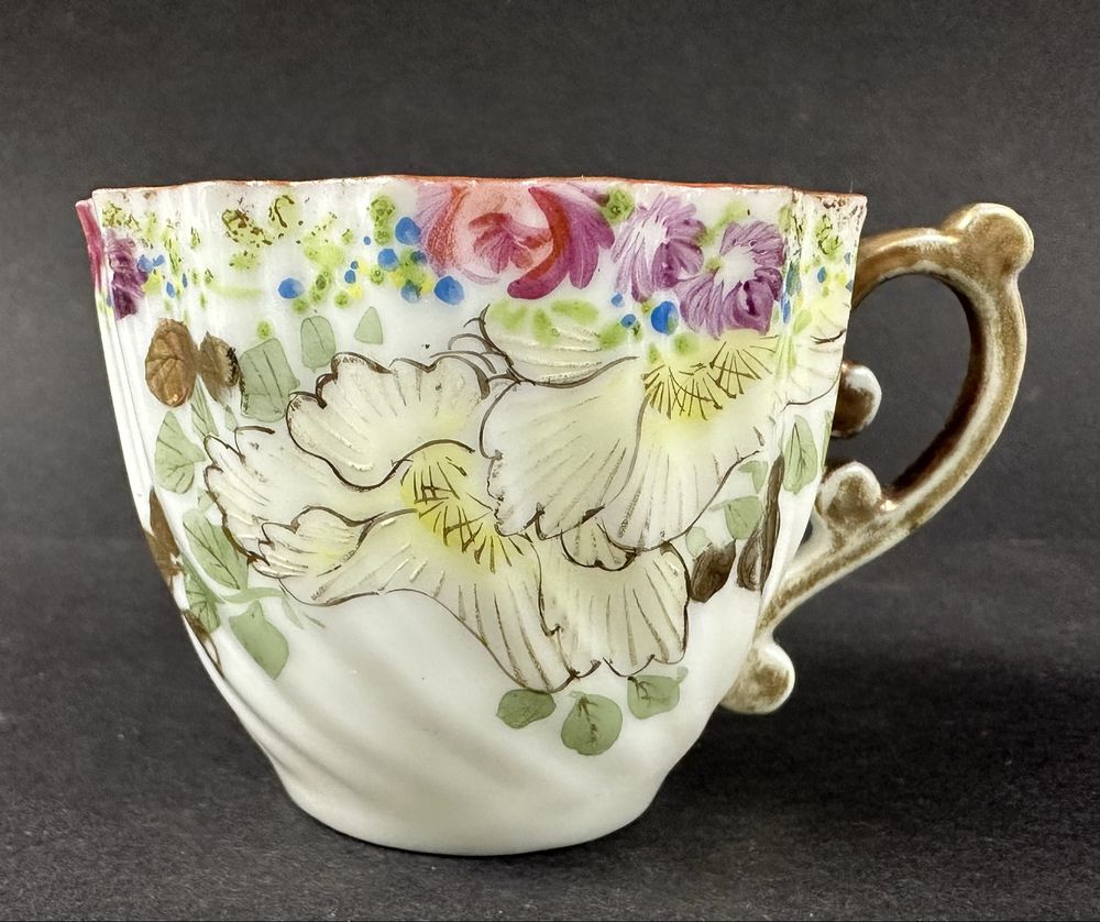 Filiżanka ze spodkiem ptak cieniutka porcelana filiżanki kwiaty