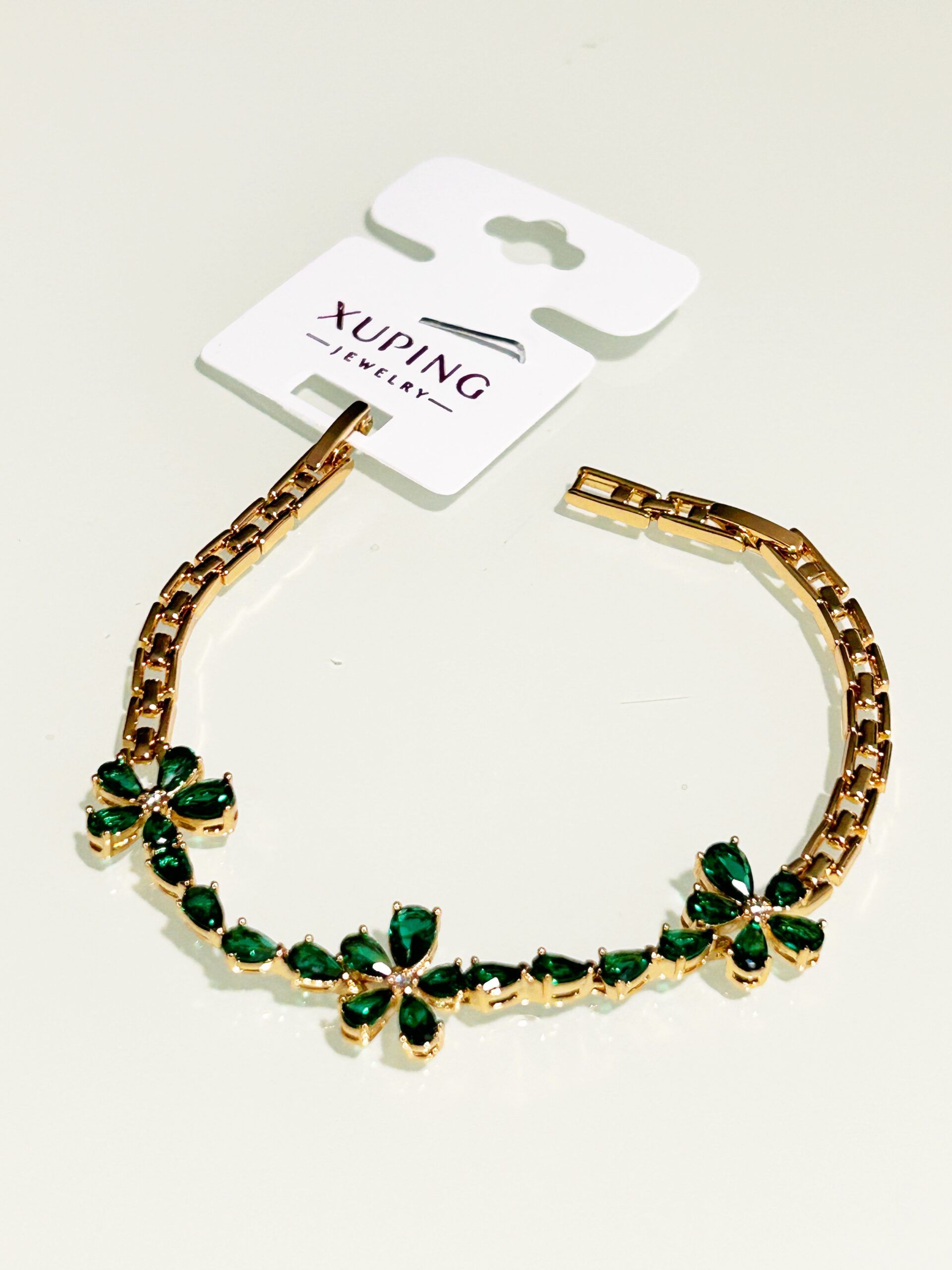 Pozłacana bransoletka damska regulowana z zielonymi oczkami Xuping