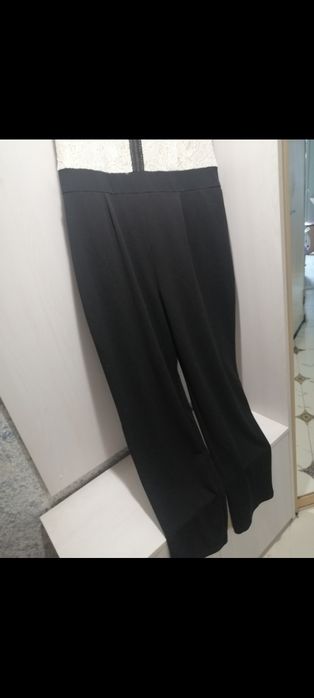 Продам стильний та святковий комбінезон. Розмір 52-54.