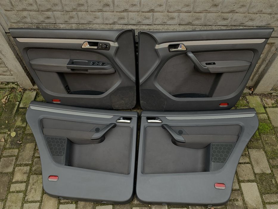 Дверні карти touran 2.0 tdi/патрубки/радіатор/дзеркало/ущільнювач/ЕГР