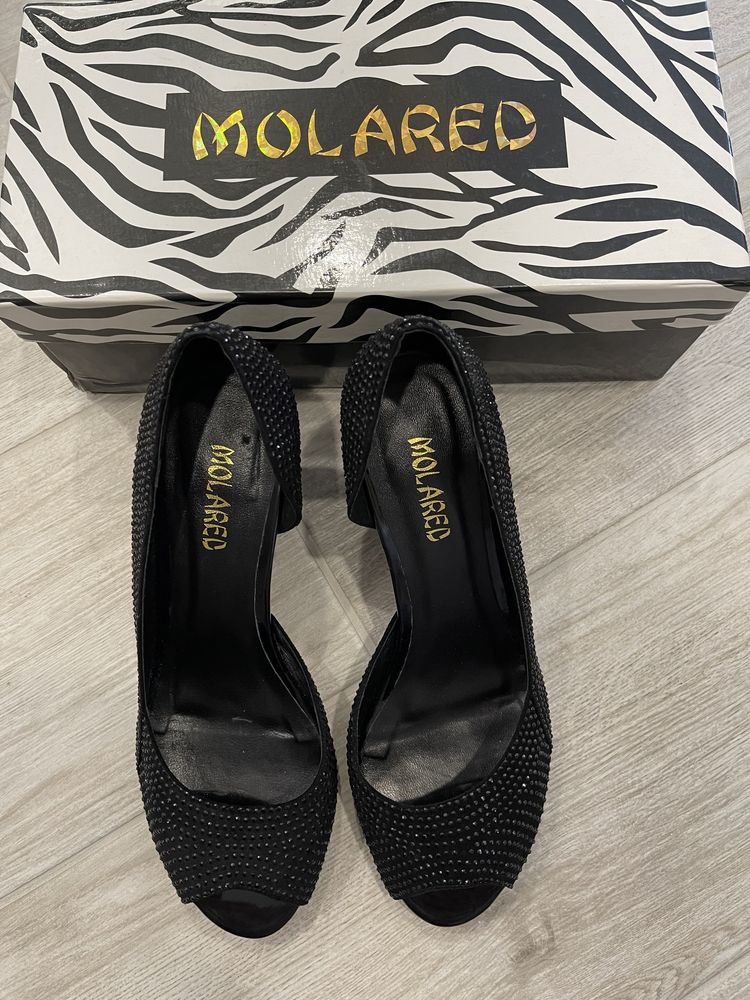 Продам женские нарядные туфли фирмы Molared.