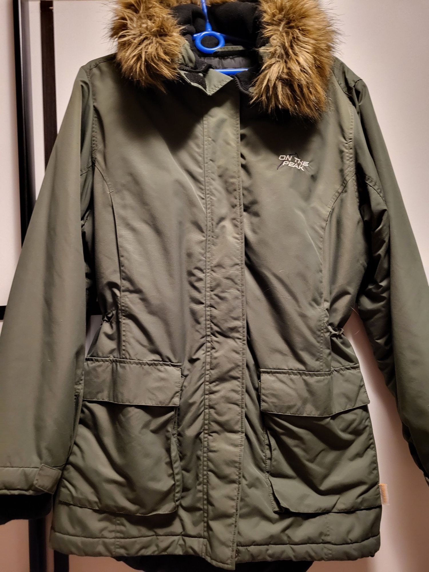 Khaki parka On The Peak