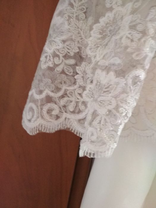 Suknia ślubna założona raz