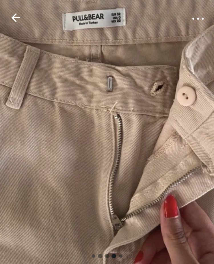 Calças bege com bolsos laterais da Pull