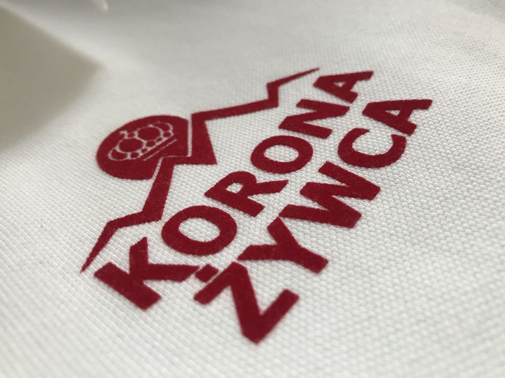 Białe polo New Wave nadruk Korona Żywca