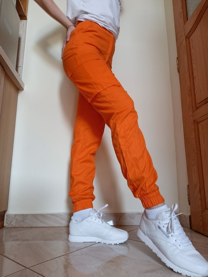 Pomarańczowe spodnie joggery ASOS Missguided XS 34