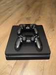 PS4 Slim 500 GB + 2 pady