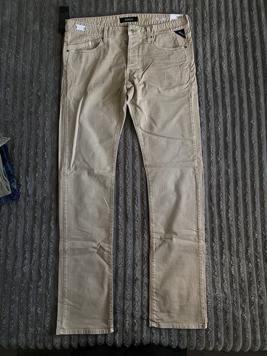 Штани бежеві брендові