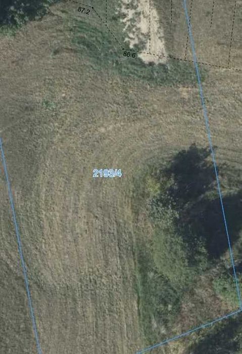 Śliczna działka w Słupcy otoczona łąkami 14 arów.