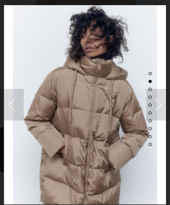 Бежевий пуховик від Zara