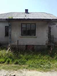 Будинок з ділянкою в м. Жовква