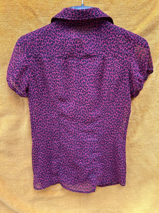 Blusa fúchsia leopardo. Como nova.