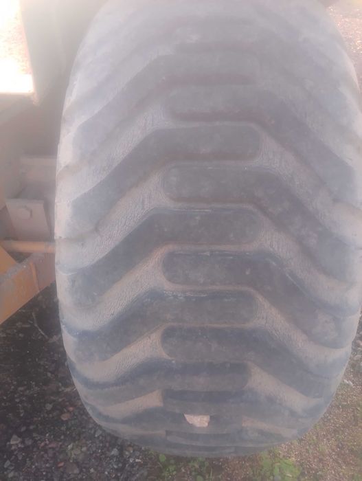 Trailla niveladora transportadora