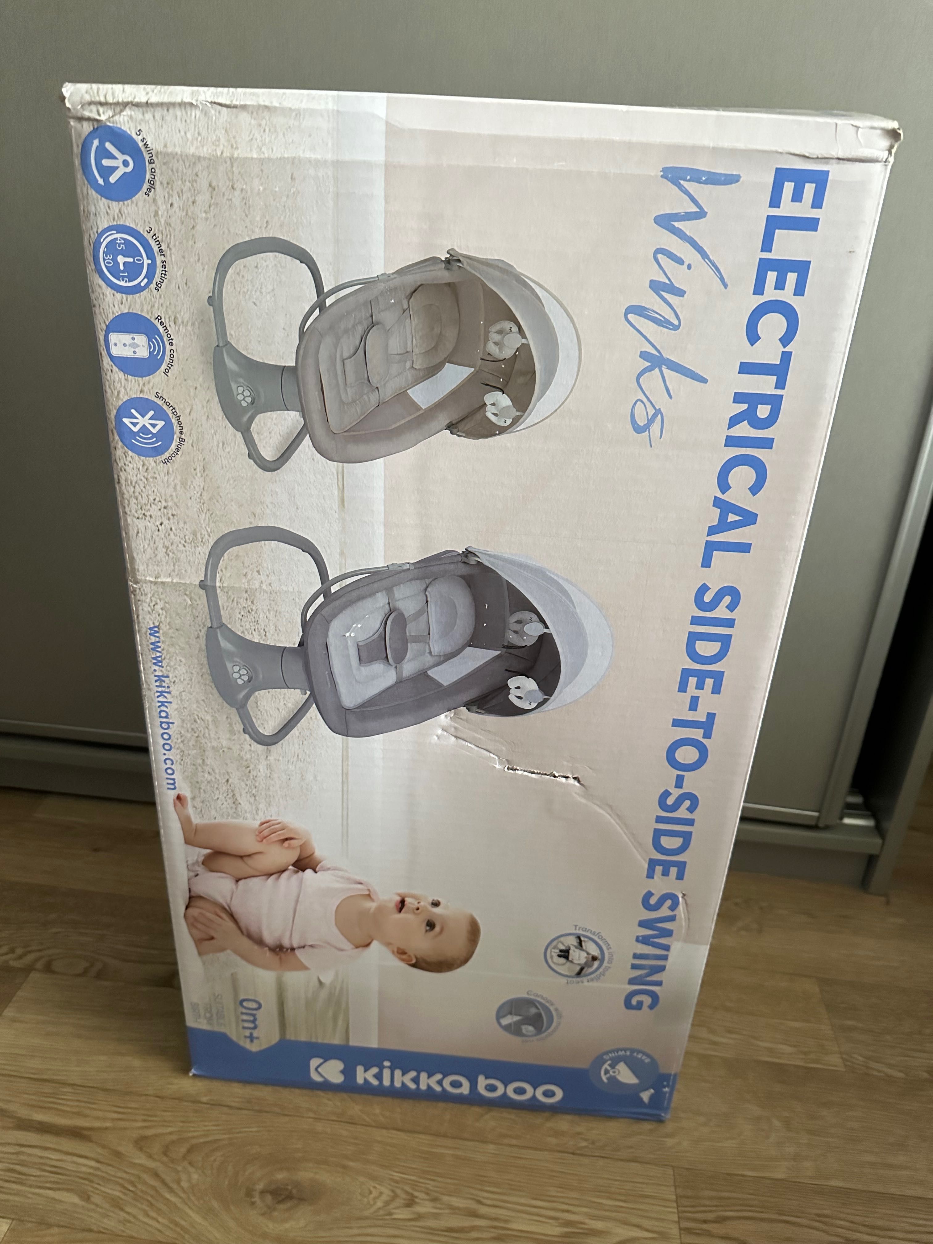 Новый запакованный  шезлонг для новорожденных