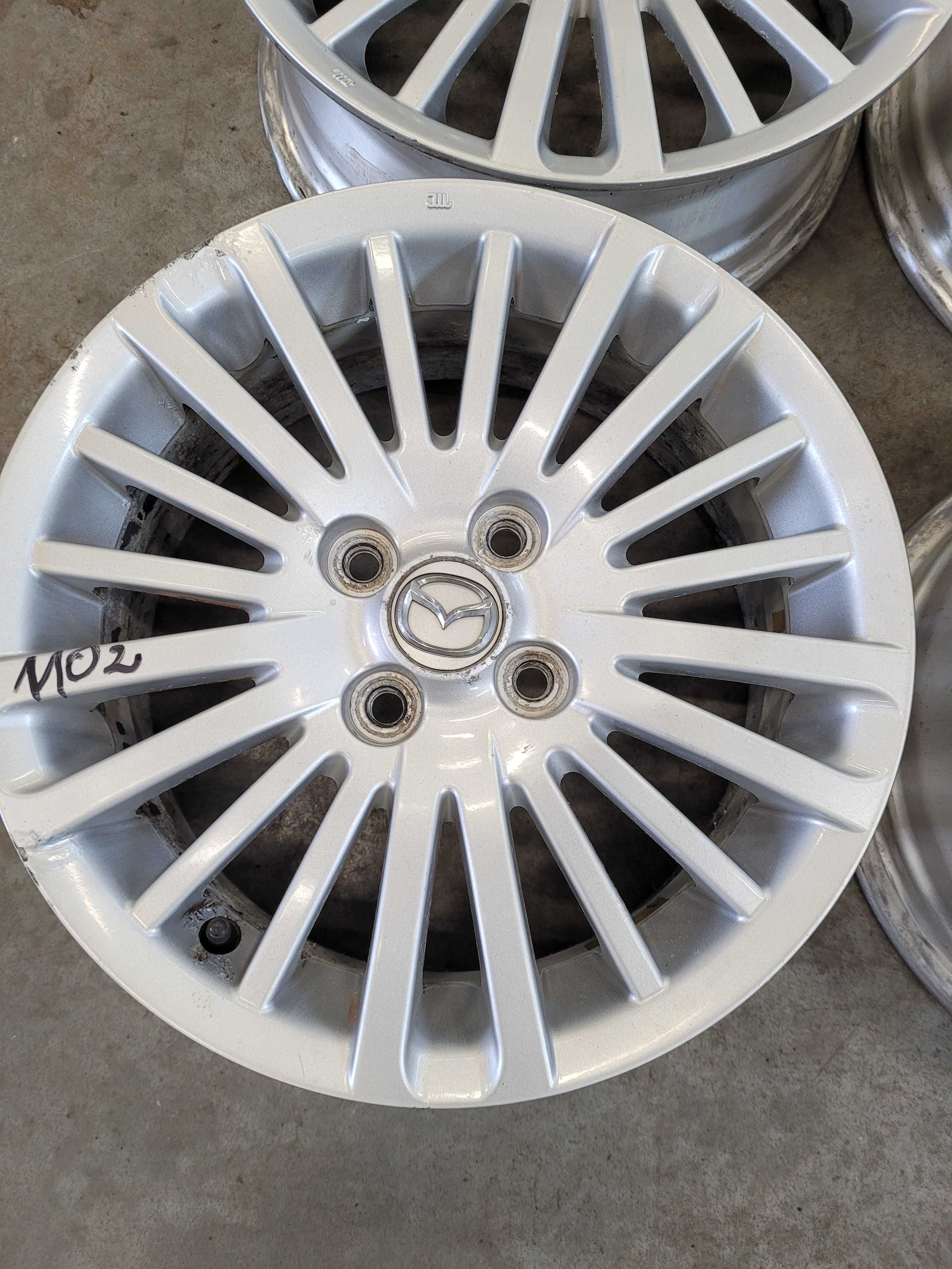 Komplet felg Mazda R 15 rozstaw 4x100 ET 40 J 6