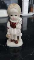 Porcelanowa figurka dziewczynka z pieskiem wys. 10.5 cm stan idealny