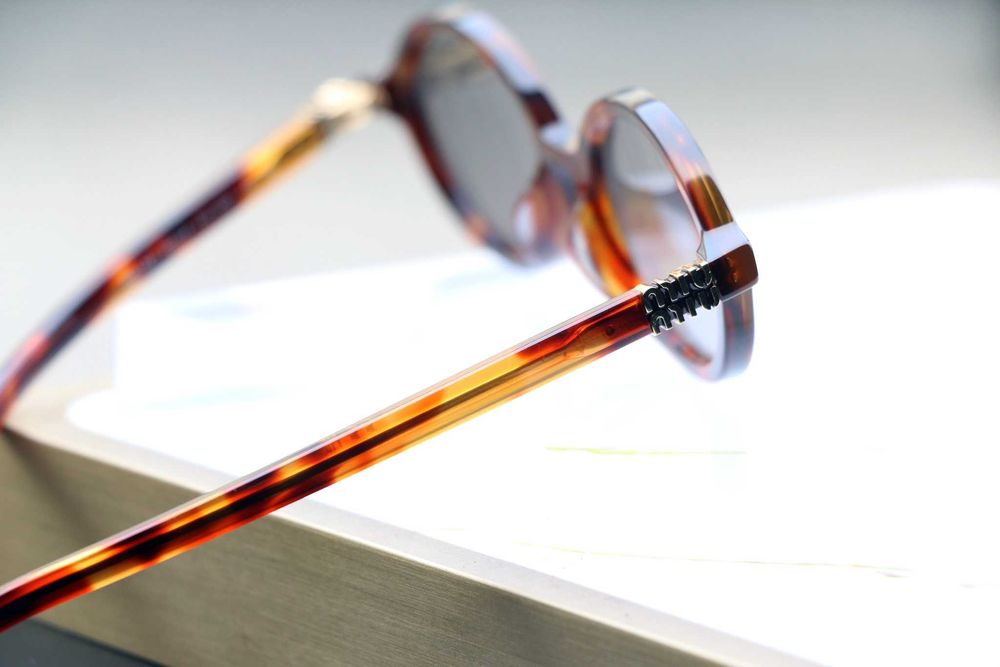 Okulary przeciwsłoneczne  Miu Miu SMU04Z. Bestseller, NOWE.Optyk