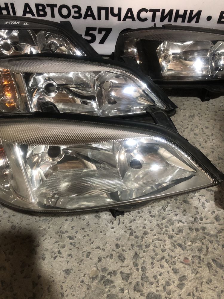 Фари, фари передні рефлектори Опель Астра Ж(Opel Astra G)90520877