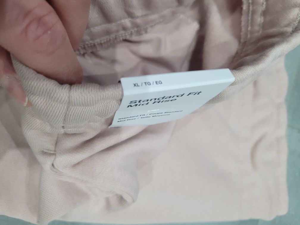 Spodnie dresowe damskie Nike XL pudrowy róż