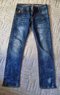 Spodnie jeans 146