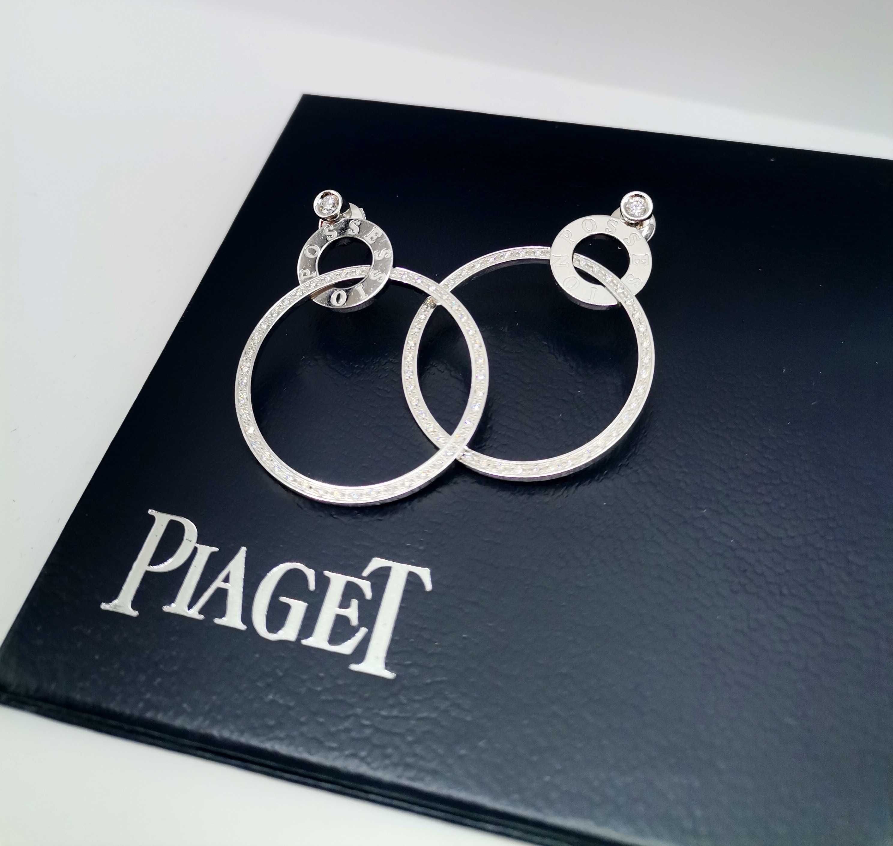 Złote kolczyki PIAGET z  brylantami.
