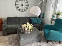 Wypoczynek z funkcja spania Sofa + Pufa Szare Stanley firmy Furninova